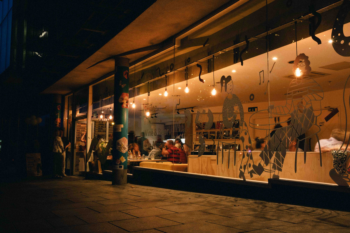 12 Bar Music & Social storefront at night, Exeter