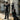 Ezra Collective Here Because of Hope album cover artwork showing three children in suits on a street	